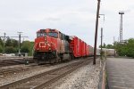 Q11651 pulls down for headroom with three air repeater boxcars at the headend